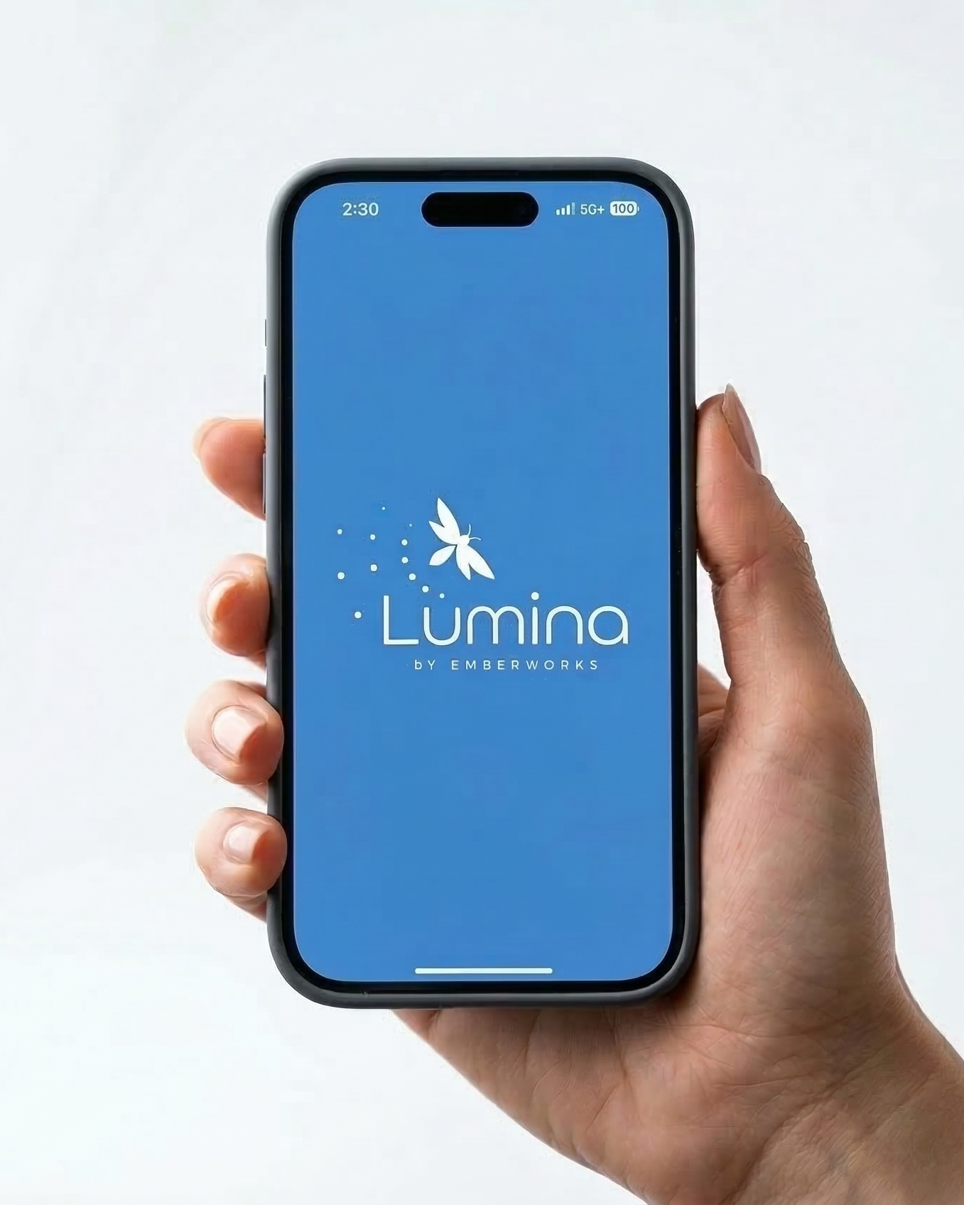 Hand holding a smartphone displaying the Lumina Link app on a white background